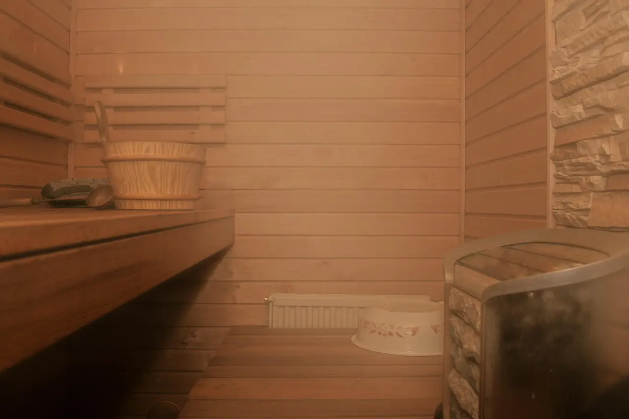 Grey stones stacked in a sauna heater
